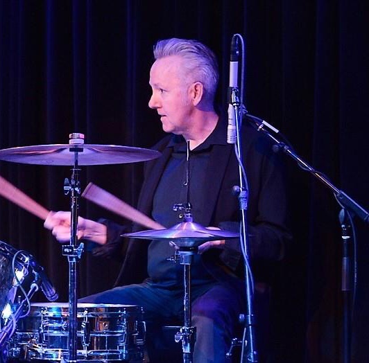 George Brandau playing drums