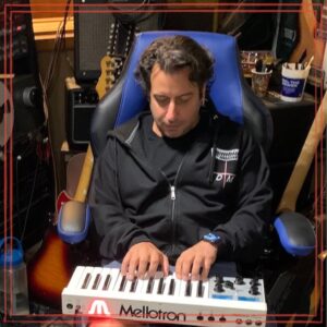 George Ajjan (The ajjancy) playing Mellotron keyboard in studio surrounded by music gear | Creating legal mashups