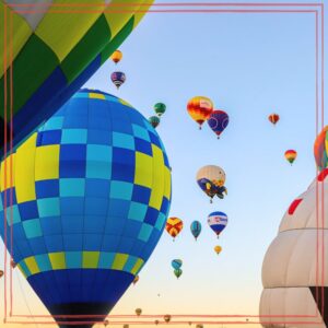 Low angle shot of airborne multi-colored hot air balloons | Photo by Lad Fury: https://www.pexels.com/photo/low-angle-shot-of-airborne-multi-colored-hot-air-balloons-3091121/ | Unstarving Musician episode artwork representing Creative Community