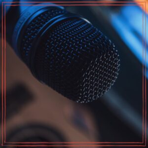 Close up shot of a microphone | Photo by SilvaNeto | https://www.pexels.com/photo/close-up-shot-of-a-microphone-7528997/